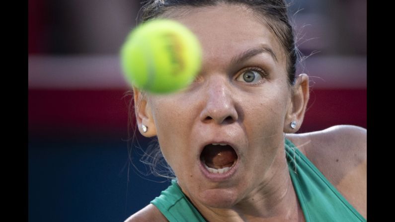 Simona Halep watches the ball as she returns to Caroline Garcia, during women's quarterfinal play at the Rogers Cup tennis tournament in Montreal on Friday, August 10. 