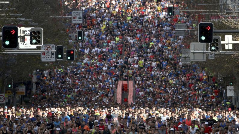 Some of the 80,000 participants in the annual City2surf fun run make their way along the 8.7-mile course in Sydney on Sunday, August 12. 