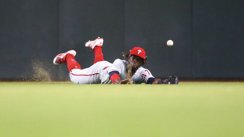 Philadelphia outfielder Odubel Herrera dives for a ball but is unable to make the catch during a Major League Baseball game in Phoenix on Wednesday, August 8.