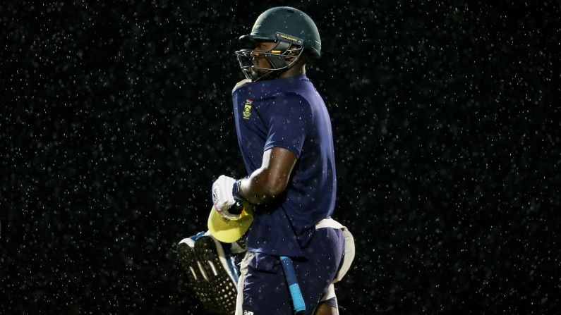 South African cricketer Andile Phehlukwayo leaves the pitch after a practice session in Sri Lanka on Tuesday, August 7.
