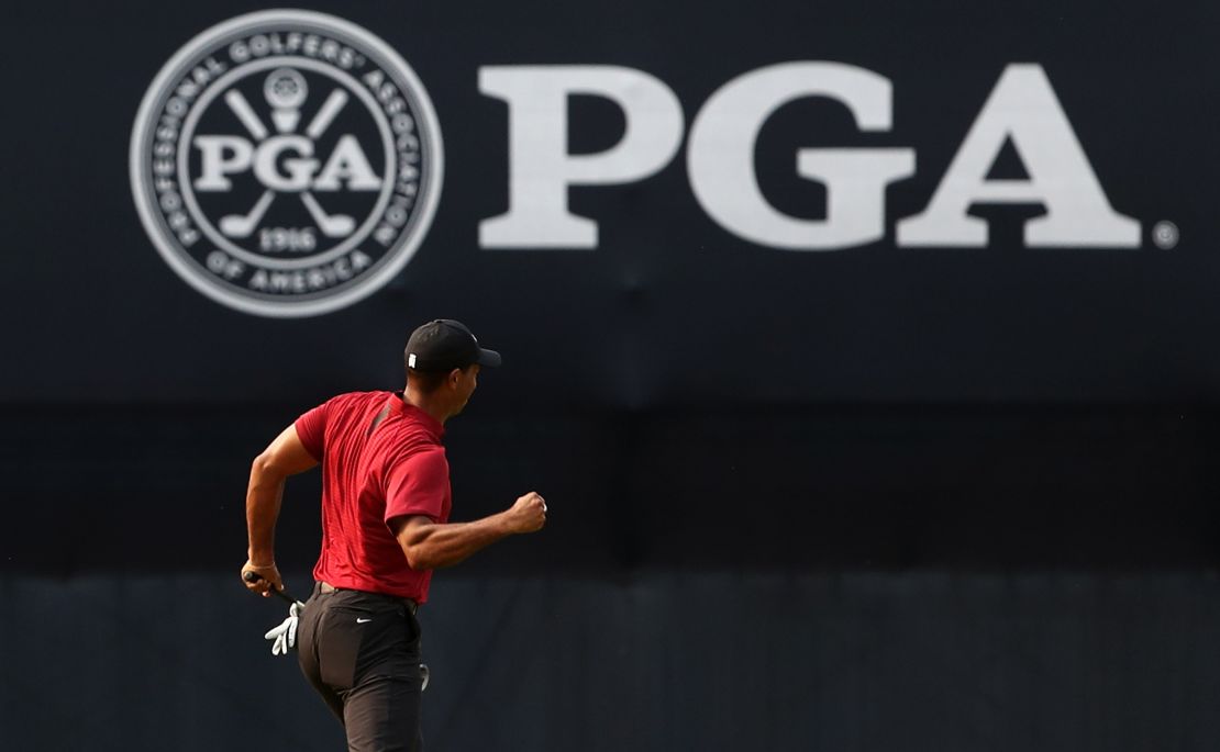 Tiger Woods reacts after holding his birdie putt on the final hole of the PGA Championship to close with a six-under 64.