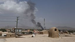 Smoke rising into the air after Taliban militants launched an attack on the Afghan provincial capital of Ghazni on August 10, 2018. - US forces launched airstrikes on August 10 to counter a major Taliban assault on an Afghan provincial capital, where terrified residents cowered in their homes amid explosions and gunfire as security forces fought to beat the insurgents back. (Photo by ZAKERIA HASHIMI / AFP)        (Photo credit should read ZAKERIA HASHIMI/AFP/Getty Images)
