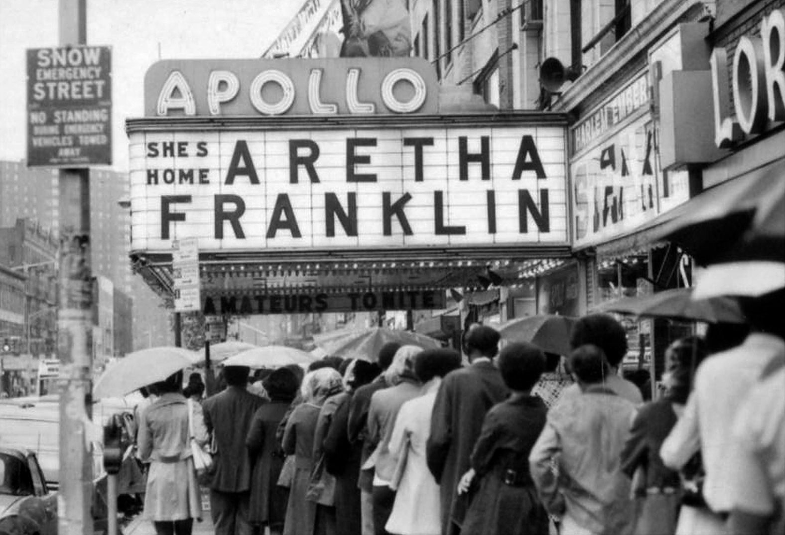 Crowds gather for a performance by Franklin at the Apollo Theater in New York City on June 3, 1971. 