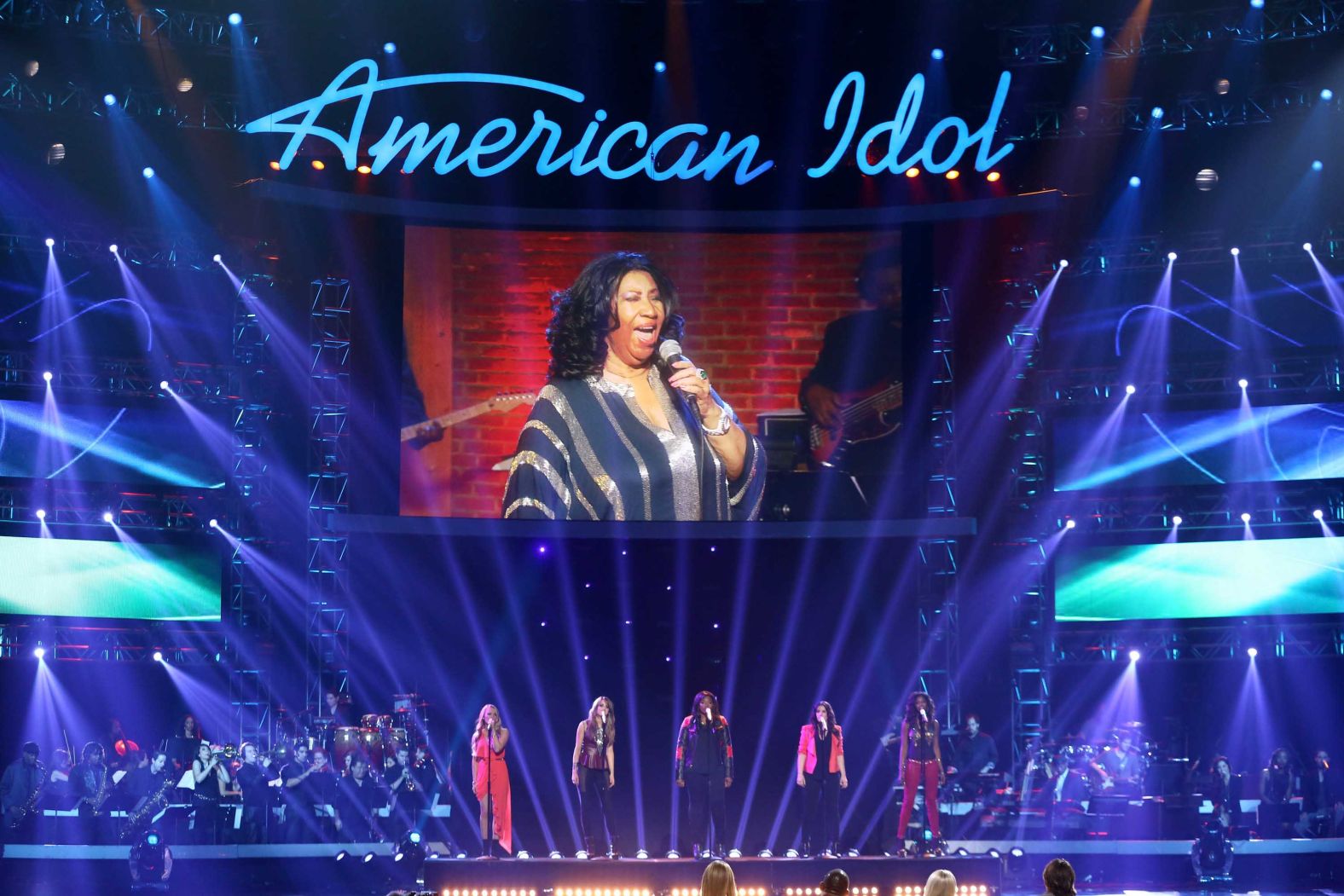 Franklin, seen on screen, at the "American Idol" finale in 2013.