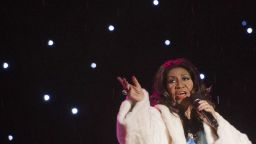 Singer Aretha Franklin performs during the National Christmas Tree Lighting ceremony on the Ellipse adjacent to the White House in Washington, DC, December 6, 2013. The event, hosted by actress Jane Lynch, features performances by Mariah Carey, Joshua Bell, Aretha Franklin, the band Train and jazz legend Arturo Sandoval. AFP PHOTO / Saul LOEB        (Photo credit should read SAUL LOEB/AFP/Getty Images)