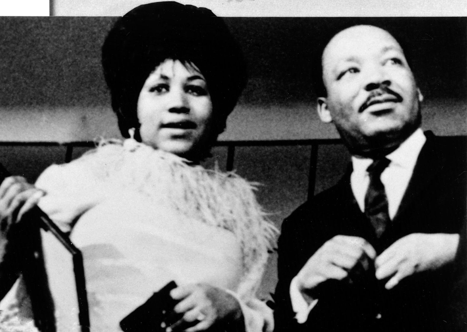 Franklin photographed with Dr. Martin Luther King, Jr. in the late 1960's. In 1968 she was asked to perform at King's funeral, where she sang a stirring rendition of "Precious Lord, Take Thy Hand."