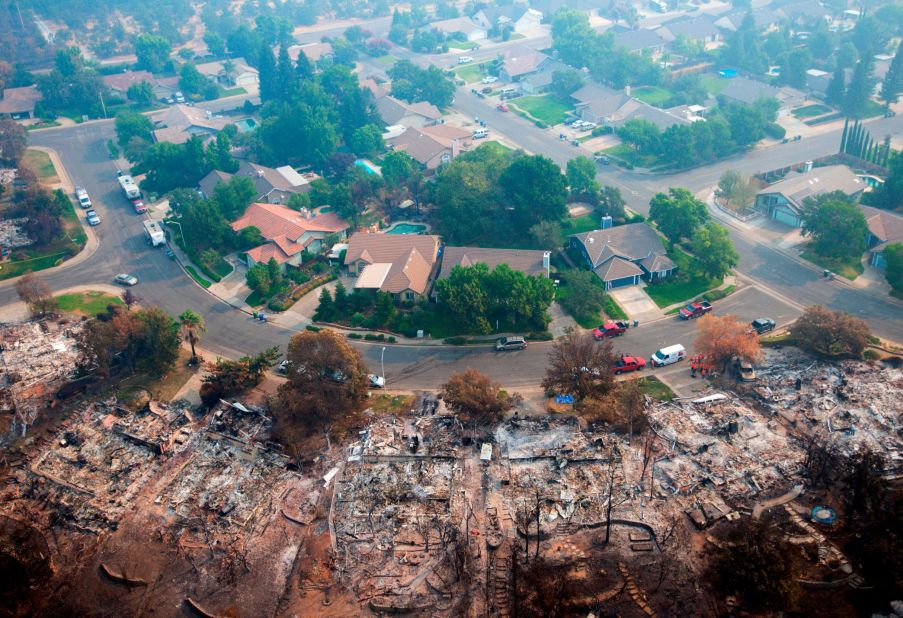 Homes destroyed by a wildfire in Redding, California are seen from an aerial view on Friday, August 10