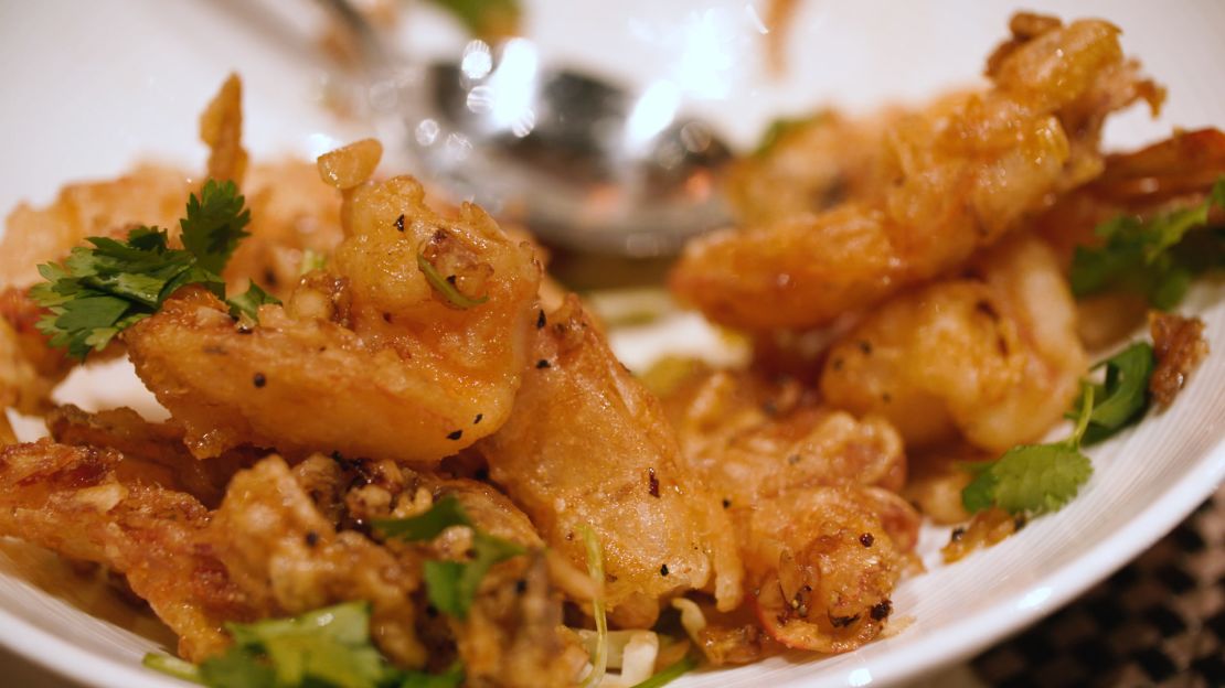 Lotus of Siam's garlic prawns are deep-fried in their shells with a special garlic sauce.