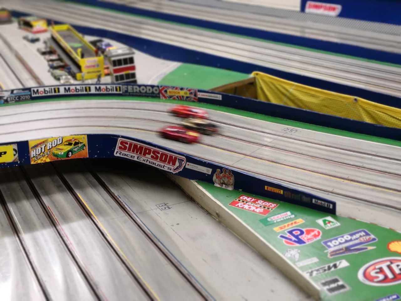 Slot car races are won and lost on curves, with cars easily spinning out of control if speed is not managed. 