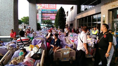 Patients were evacuated as fire spread through a hospital in New Taipei City Monday.