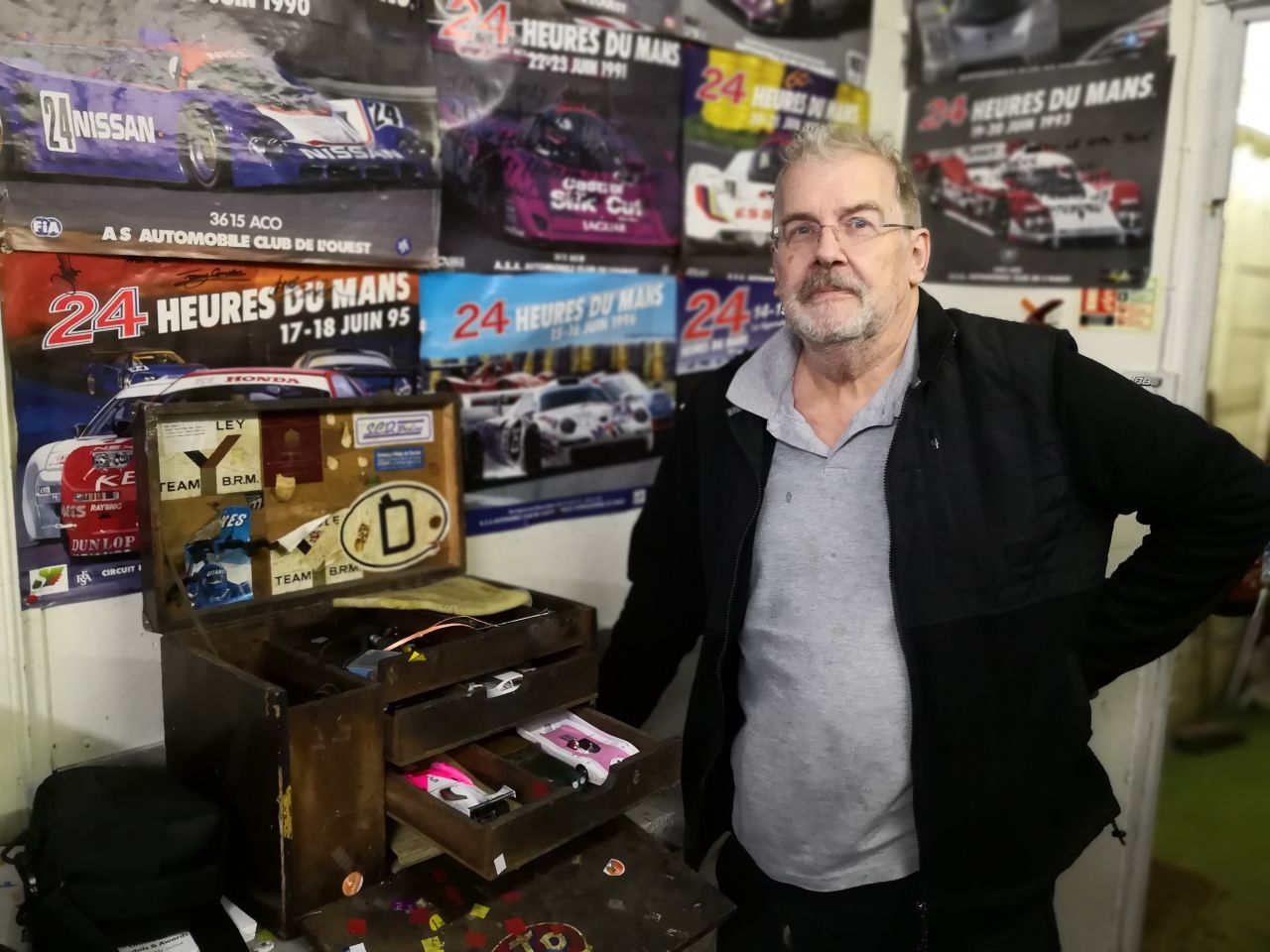 Bob Hallums, of the North London Society of Model Engineers, poses with his workshop kit on a recent racing day. Members often fine-tune slot cars at home in anticipation of their weekly racing nights. 