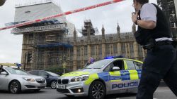 Police cordon off an area around Westminster after a man crashed a car into security barriers outside Parliament in London, England, on Tuesday, August 14.