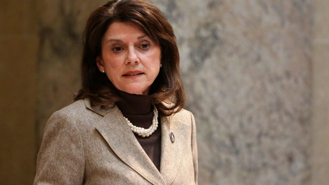 State Sen. Leah Vukmir stands in the Senate chambers at the state Capitol in Madison, Wis.