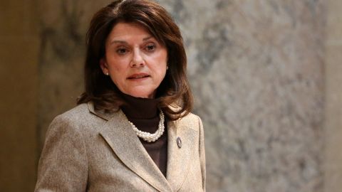 State Sen. Leah Vukmir stands in the Senate chambers at the state Capitol in Madison, Wis.