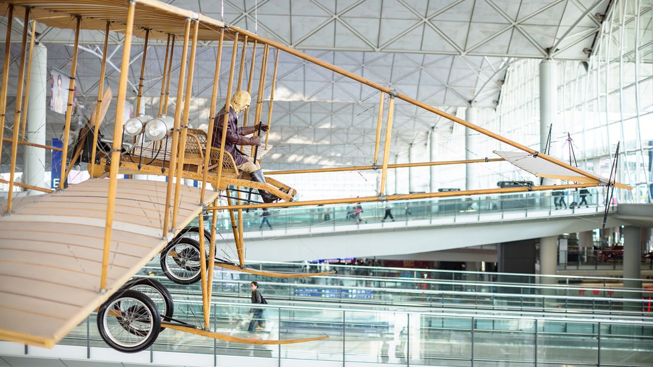 <strong>The Spirit of Sha Tin: </strong>The installation that hangs in the hall of Terminal 1 is called "The Spirit of Sha Tin." It's a replica of a Farman Biplane that once made a historical flight over Hong Kong in 1911.
