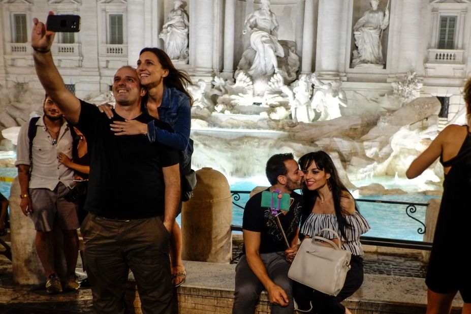 <strong>Unexpected violence:</strong> The tourists pictured here are all smiles, but the ones involved in the incident last week<strong> </strong>had a verbal confrontation that turned physical, according to police.