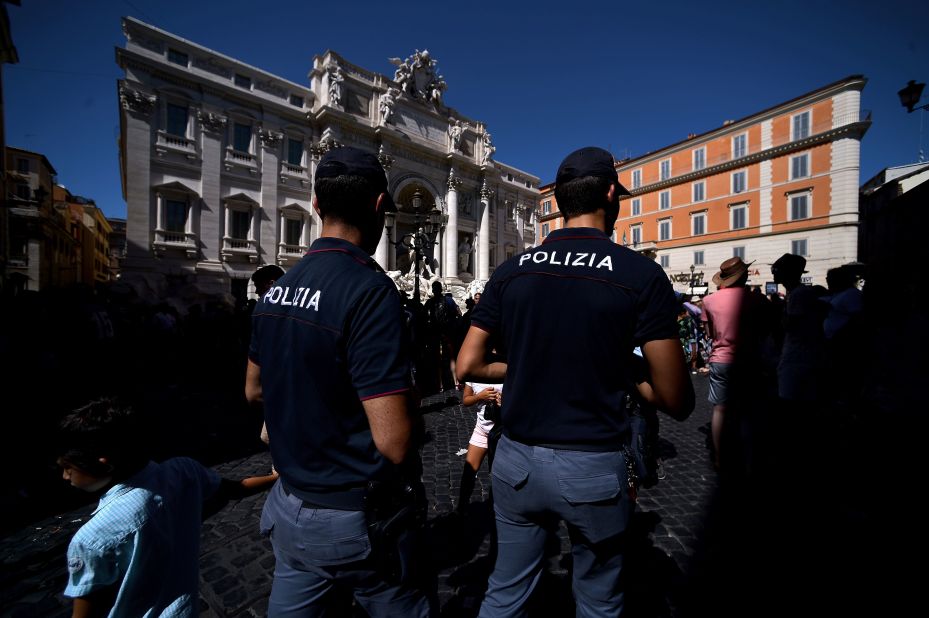 <strong>Crowd control</strong>: Police patrol the fountain in order to monitor crowds and behavior.