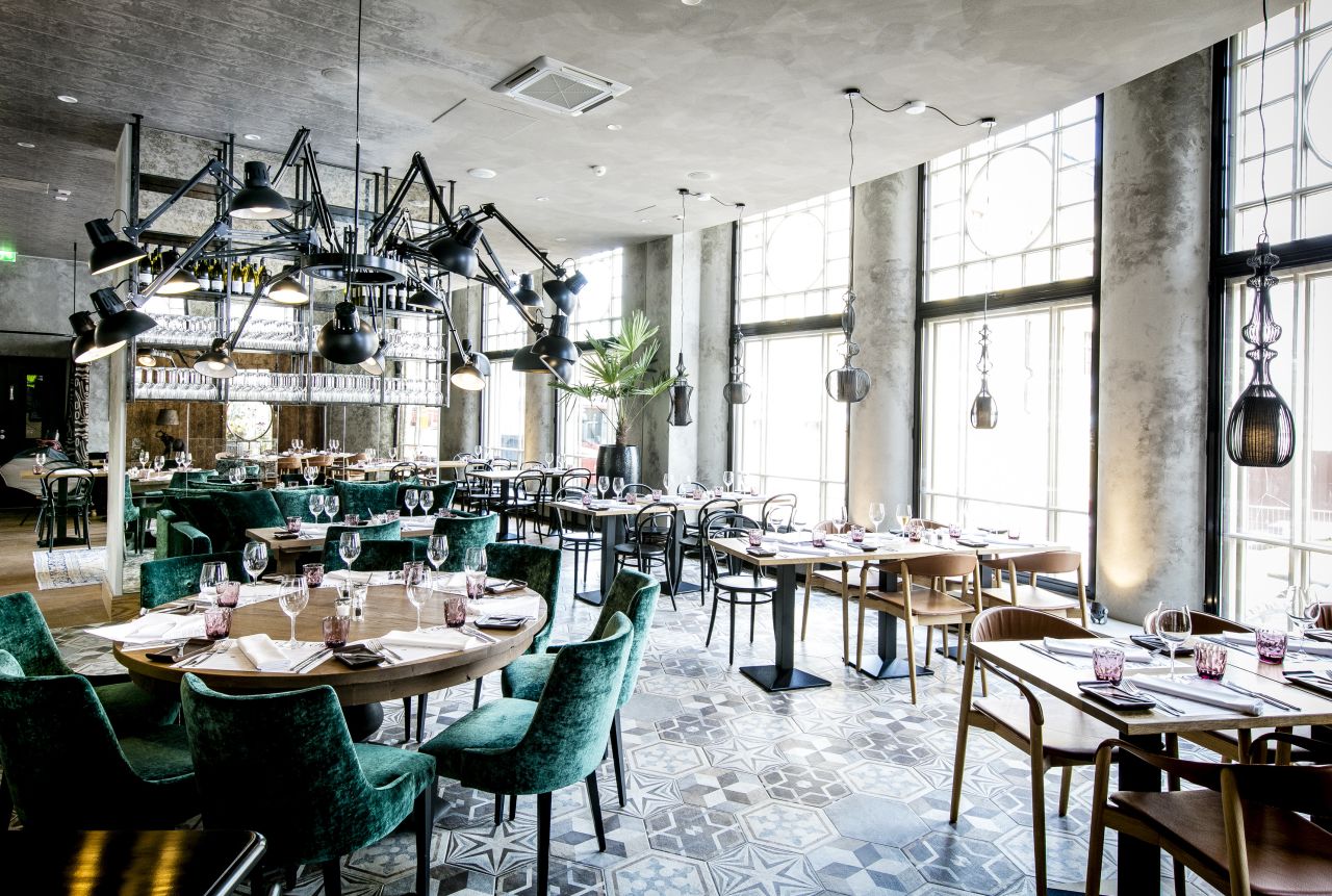 <strong>Krog Roba:</strong> The restaurant inside Hotel Lilla Roberts is at home in the city's design district. Plush green velvet seating and creative lighting are just a couple of the room's highlights.