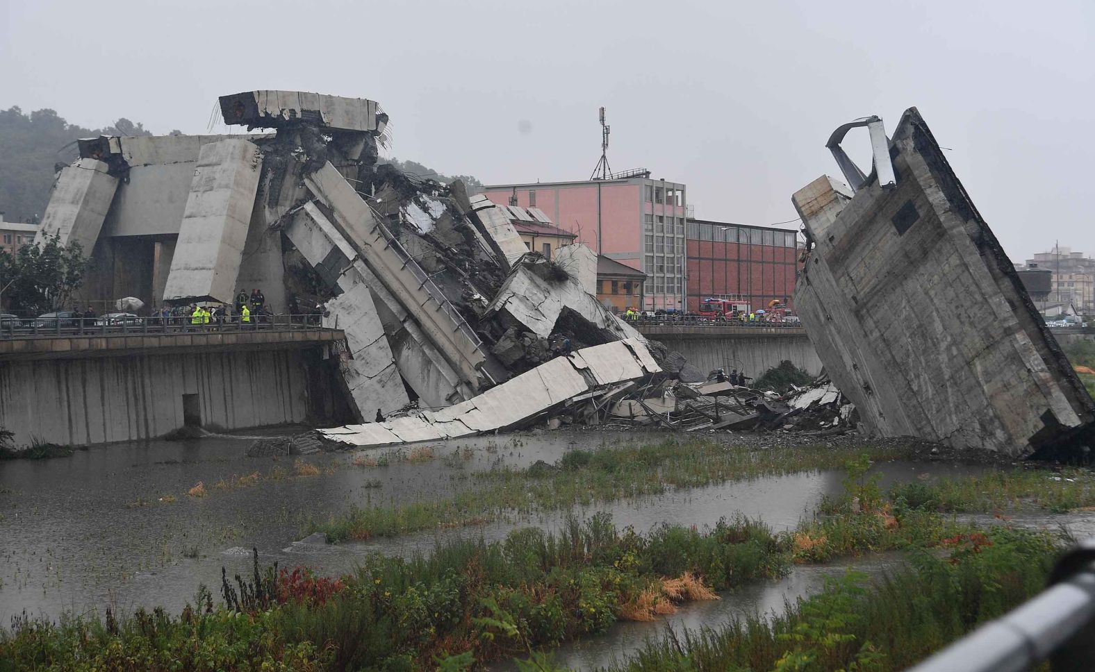 Concrete slabs crumpled on top of each other when the section of the bridge collapsed.