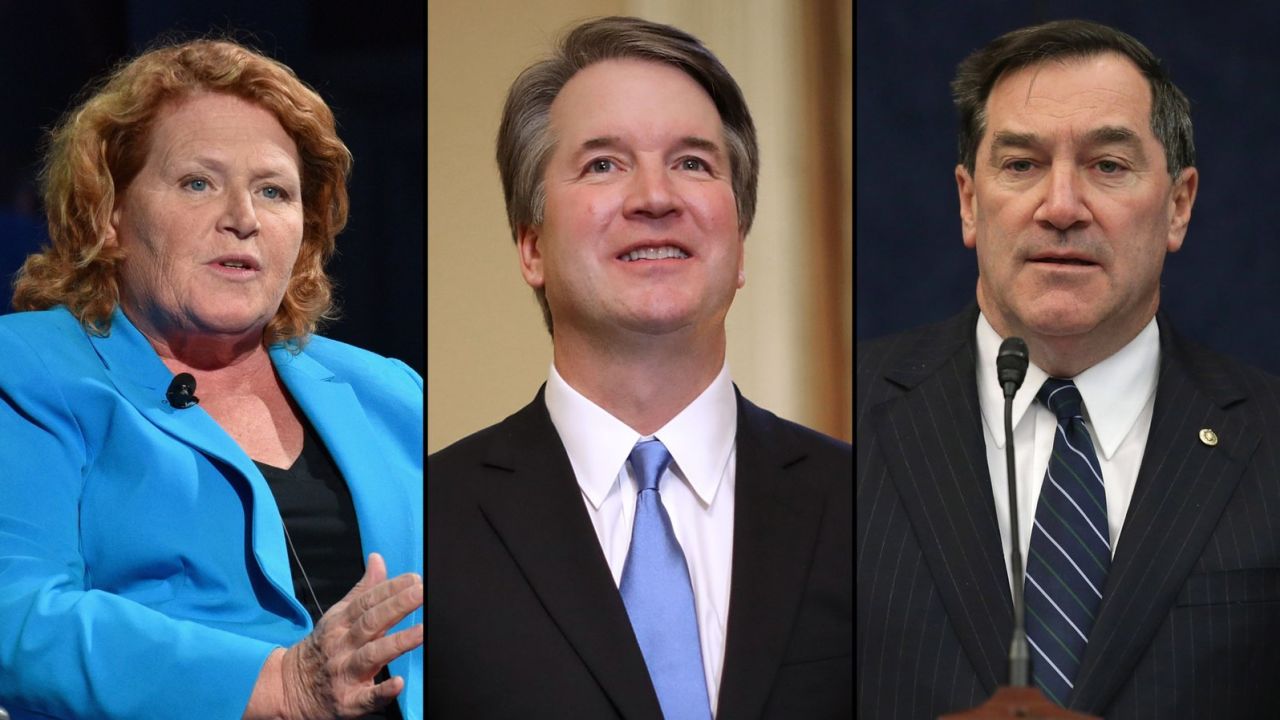 From left, North Dakota Democratic Sen. Heidi Heitkamp, President Donald Trump's nominee to the Supreme Court Brett Kavanaugh and Indiana Democratic Sen. Joe Donnelly.