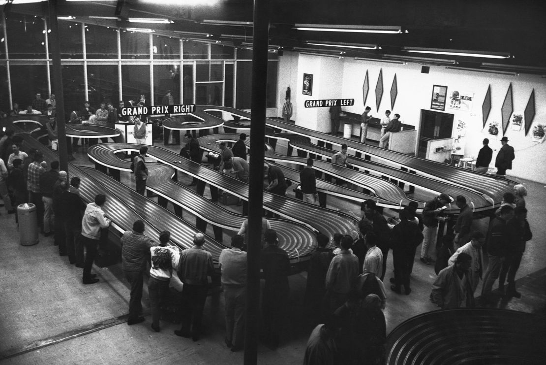 Before the proliferation of video games, crowds of men would gather to race slot cars in arcades like this one in San Francisco. 