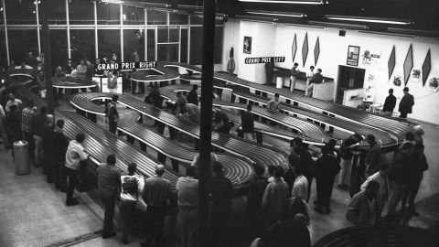 Before the proliferation of video games, crowds of men would gather to race slot cars in arcades like this one in San Francisco. 