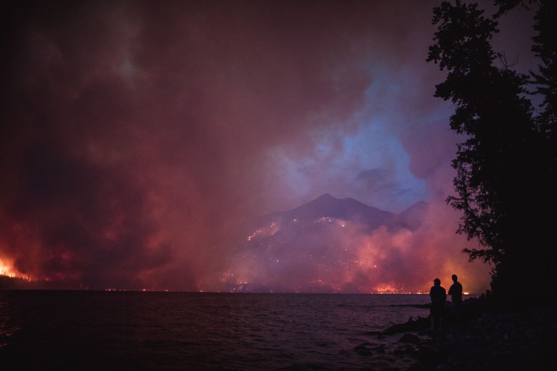 The Howe Ridge Fire is seen on the night of August 12.