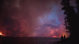 The Howe Ridge Fire seen from across Lake McDonald on the night of August 12th, roughly 24 hours after the fire was started by a lightning strike in an area previously burned in the 2003 Roberts Fire.