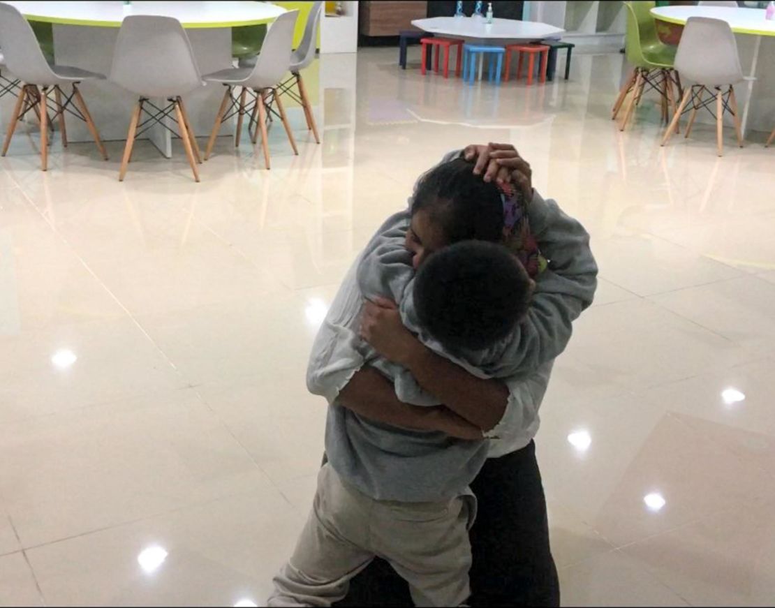 Anthony Ortiz, 9, and his mother reunite Tuesday night in their native Guatemala.