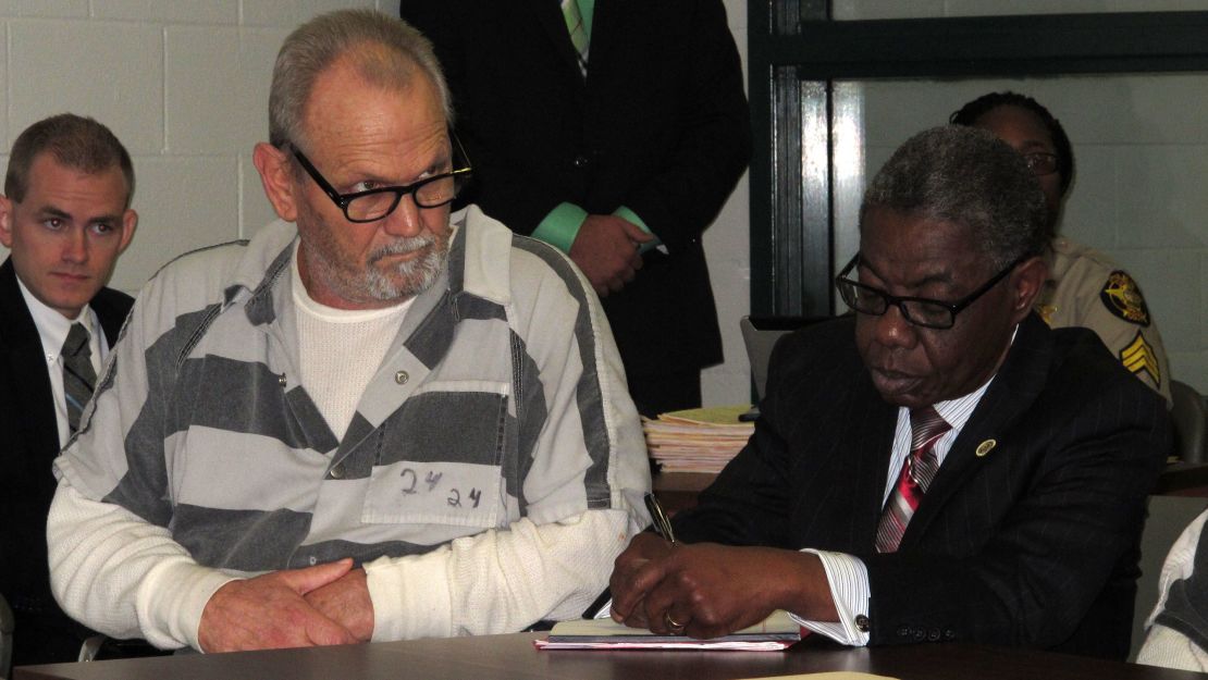 Bill Moore Sr., left, attends a November hearing with attorney Harry Charles. 