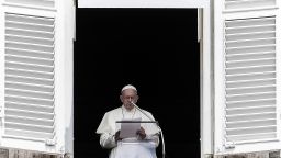 Pope Francis reads to pilgrims during The Angelus Prayer from the window of his studio overlooking St. Peter's Square, The Vatican on August 15, 2018, on The Feast of Assumption. - The pontiff said his thoughts are with the families of the victims, the wounded and the displaced following the deadly Morandi bridge collapse in Genoa. (Photo by FILIPPO MONTEFORTE / AFP)        (Photo credit should read FILIPPO MONTEFORTE/AFP/Getty Images)