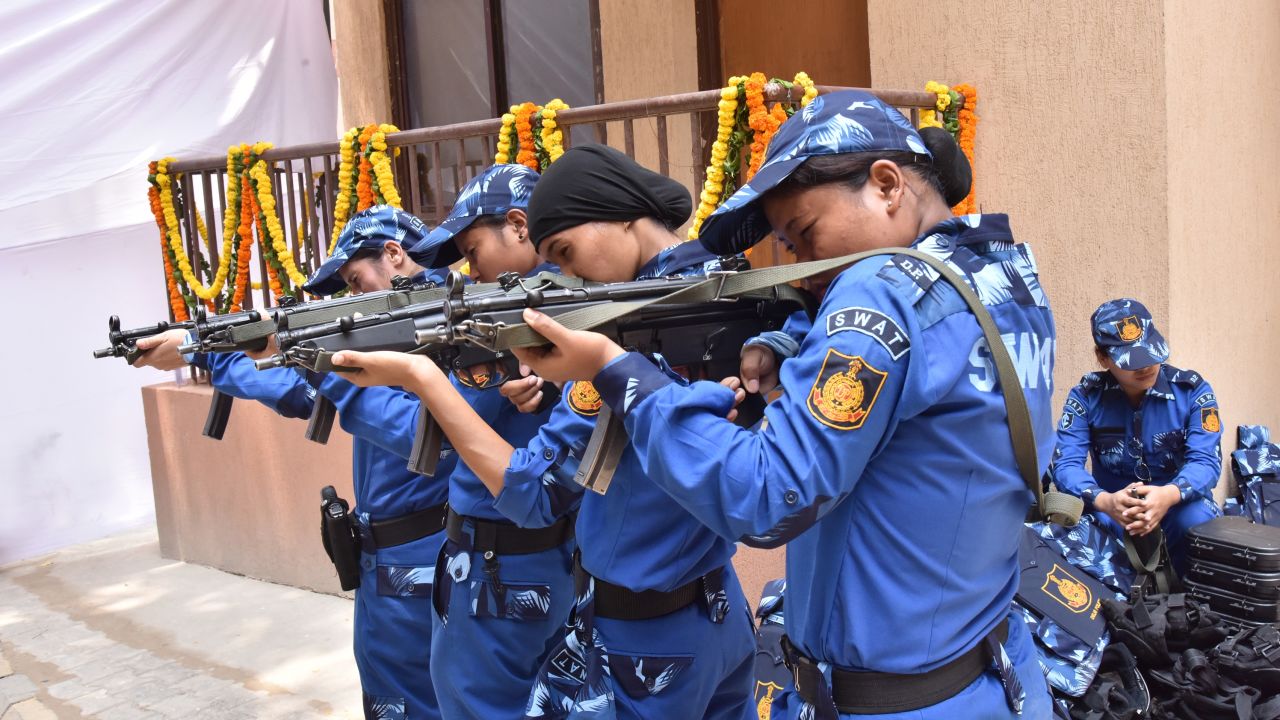 Members of India's first all-woman SWAT team pose for photos ahead of their first deployment. 