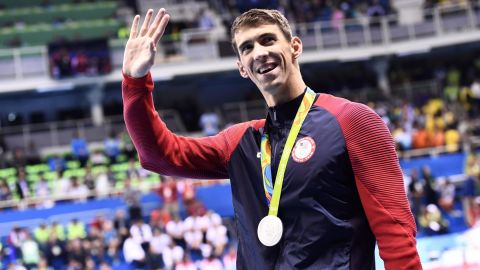 Michael Phelps waves during the medal ceremony of the Men's 100m Butterfly Final at the Rio 2016 Olympic Games.