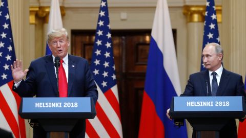 Trump speaks beside Russian President Vladimir Putin during a press conference after their meeting at the Presidential Palace in Helsinki, Finland, Monday, July 16, 2018. 