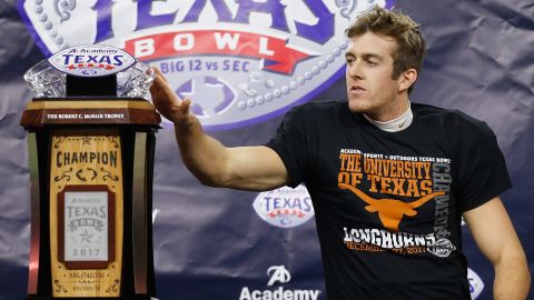 Dickson accepted the MVP award for his performance at the Texas Bowl in December. He was drafted by the Seattle Seahawks in the fifth round. 