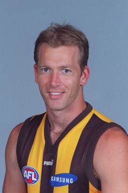 Nathan Chapman, shown posing for the Hawthorn Hawks in 2000, played Australian rules football for eight years before trying out for the NFL. 