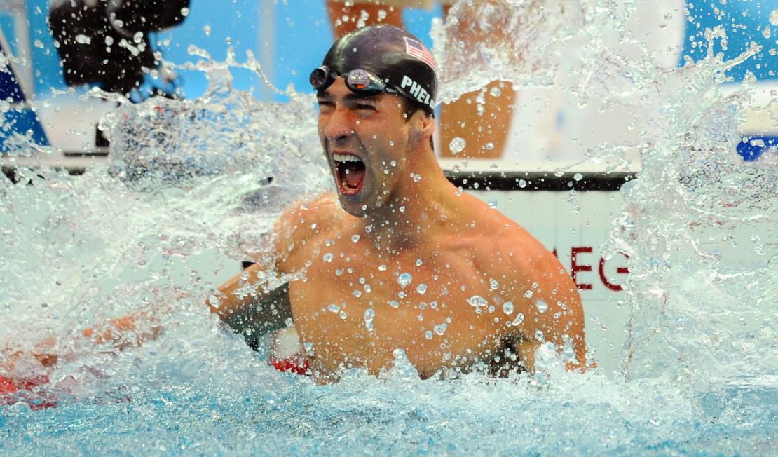 Phelps celebrates winning the 100m butterfly at the 2008 Beijing Olympics. 