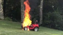 Mother pulls children from toy car just before it bursts into flames