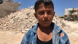 Ibrahim Dervish used to play right outside the ice cream shop with his friends who were killed in the airstrike. The shopkeeper would sometimes give them free ice cream. Ibrahim's favorite is mixed cherry and vanilla in a cone. 