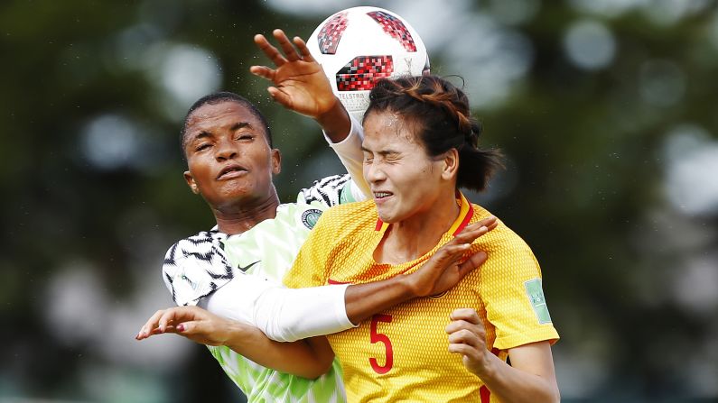 Nigeria's Rasheedat Ajibade vies for the ball with China's Qiaozhu Chen during a Women's World Cup football match on Monday, August 13, in Léhon, France.