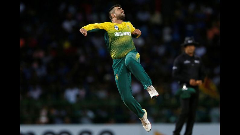 South Africa's Tabraiz Shamsi celebrates after taking the wicket of Sri Lanka's Thisara Perera in a cricket game on Tuesday, August 14, in Colombo, Sri Lanka. <a href="index.php?page=&url=https%3A%2F%2Fwww.cnn.com%2F2018%2F08%2F12%2Fsport%2Fgallery%2Fwhat-a-shot-sports-0813%2Findex.html" target="_blank">See 33 amazing sports photos from last week</a>