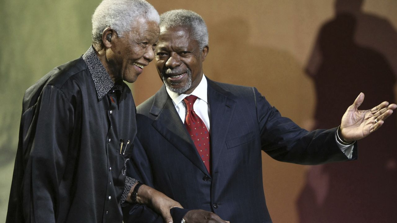 In this 2007 file photo, Nelson Mandela and Kofi Annan arrive together at the 5th Nelson Mandela Annual Lecture in South Africa.