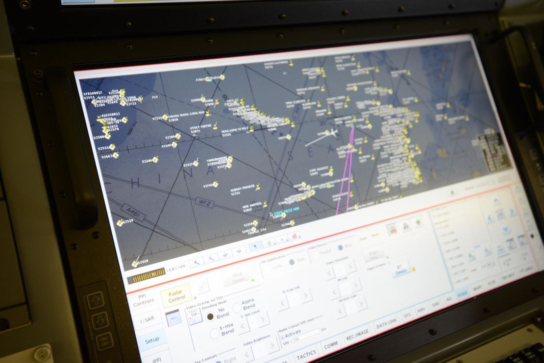 A screen in the air combat center of a US Navy P-8A shows shipping traffic around the South China Sea on Aug. 10, 2018