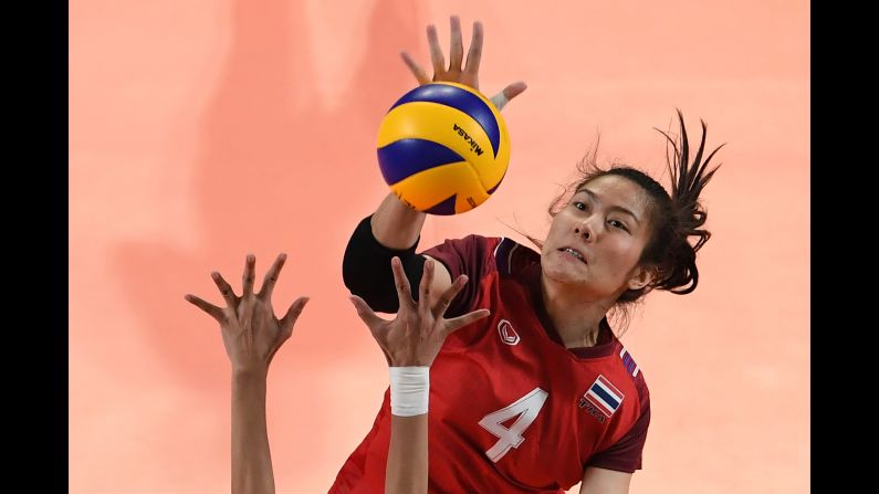 Thailand's Thatdao Nuekjang hits the ball during a volleyball match between the Philippines and Thailand at the Asian Games in Jakarta, Indonesia, on Sunday, August 19.