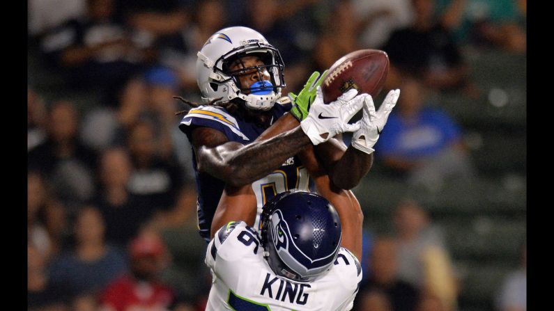 Mike Williams of the Los Angeles Chargers catches a touchdown over Akeem King of the Seattle Seahawks on Thursday, August 18. The Chargers won 24-14.