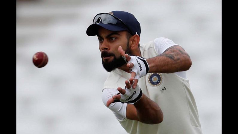 India's Virat Kohli catches the ball during a cricket nets session in Nottingham, England, on Friday, August 17.