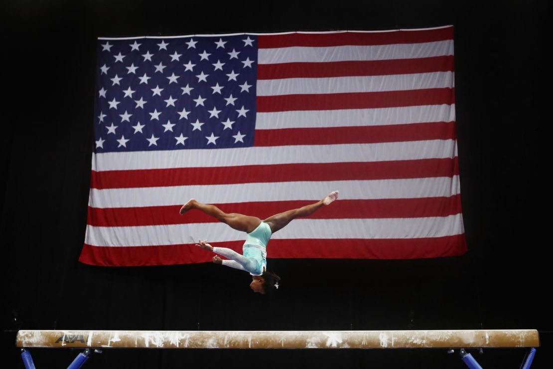 Biles wore a teal leotard, the designated color for survivors of sexual abuse