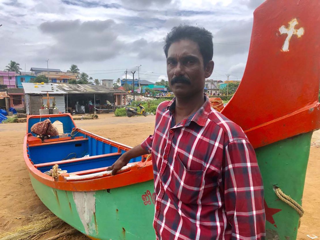 Fisherman Marion George says Hindu Brahmin flood victims would only let him rescue them if he did not touch them.