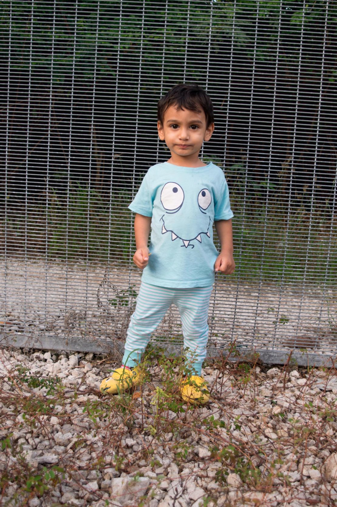 George likes to play with his toy car and he loves to write. He was born in Nauru -- the family have been on the island for 5 years.