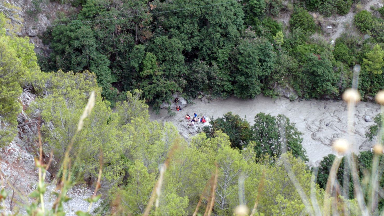 Rescuers work at the Raganello Gorge in Civita, Italy, on Monday.